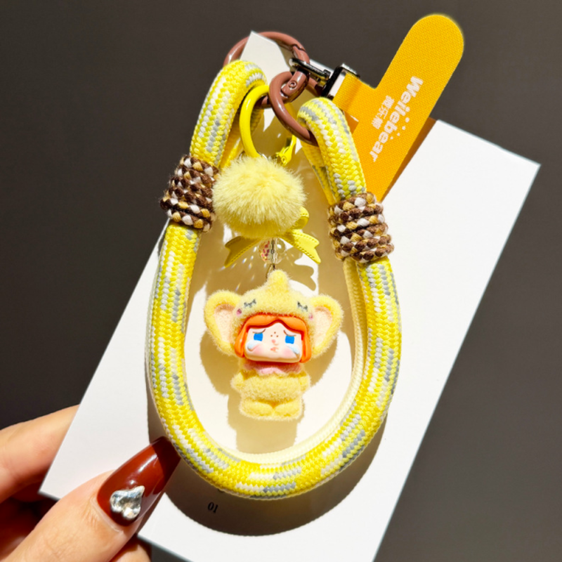 Lanière Téléphone Poignet Moelleuse Jaune avec Porte-clés Poupée — ECO · Smarty Paris 18e